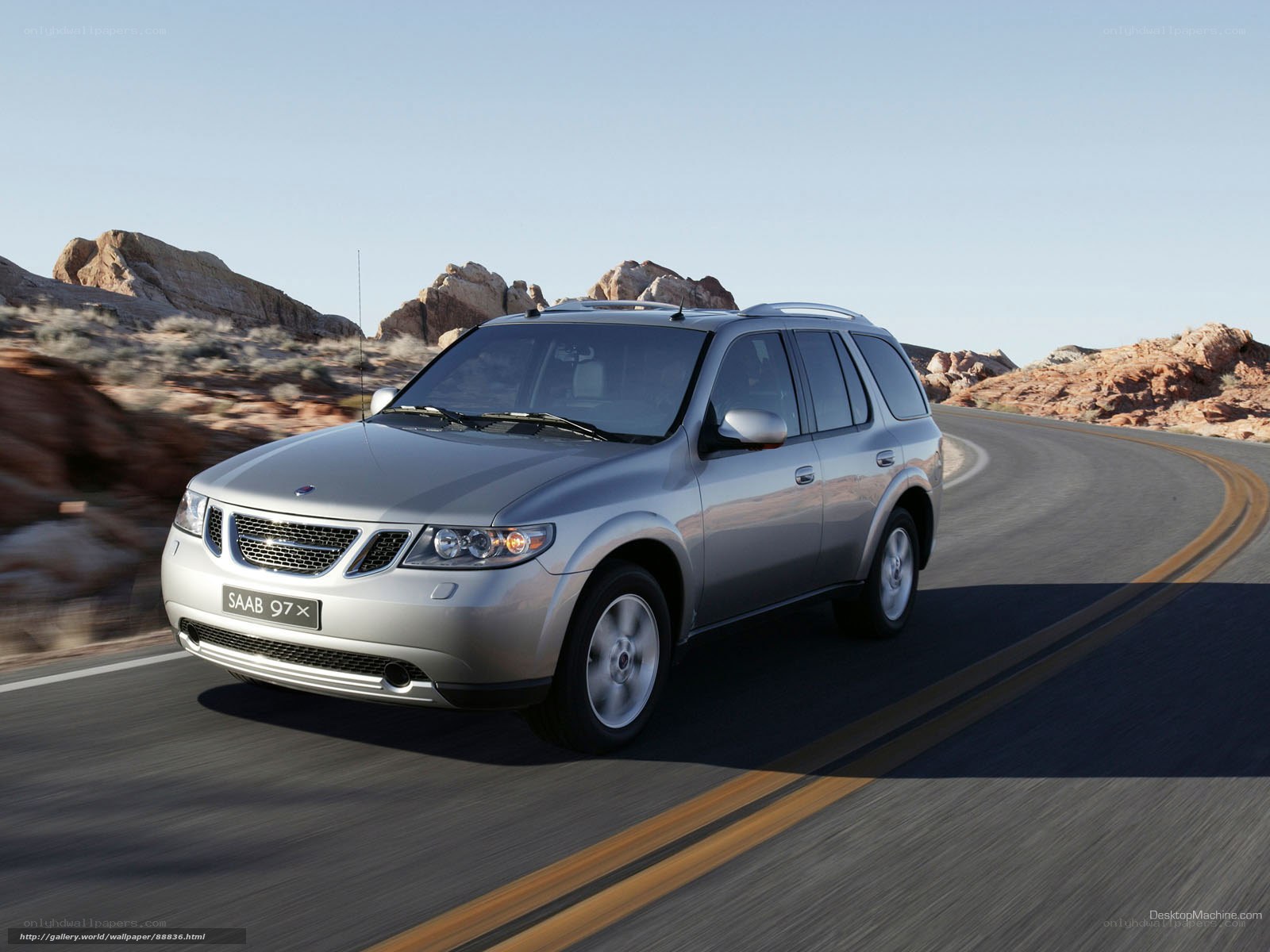 silver saab 9-7x on desert road