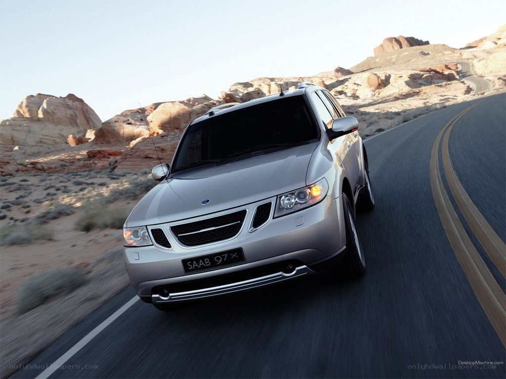 silver saab 9-7x on desert road
