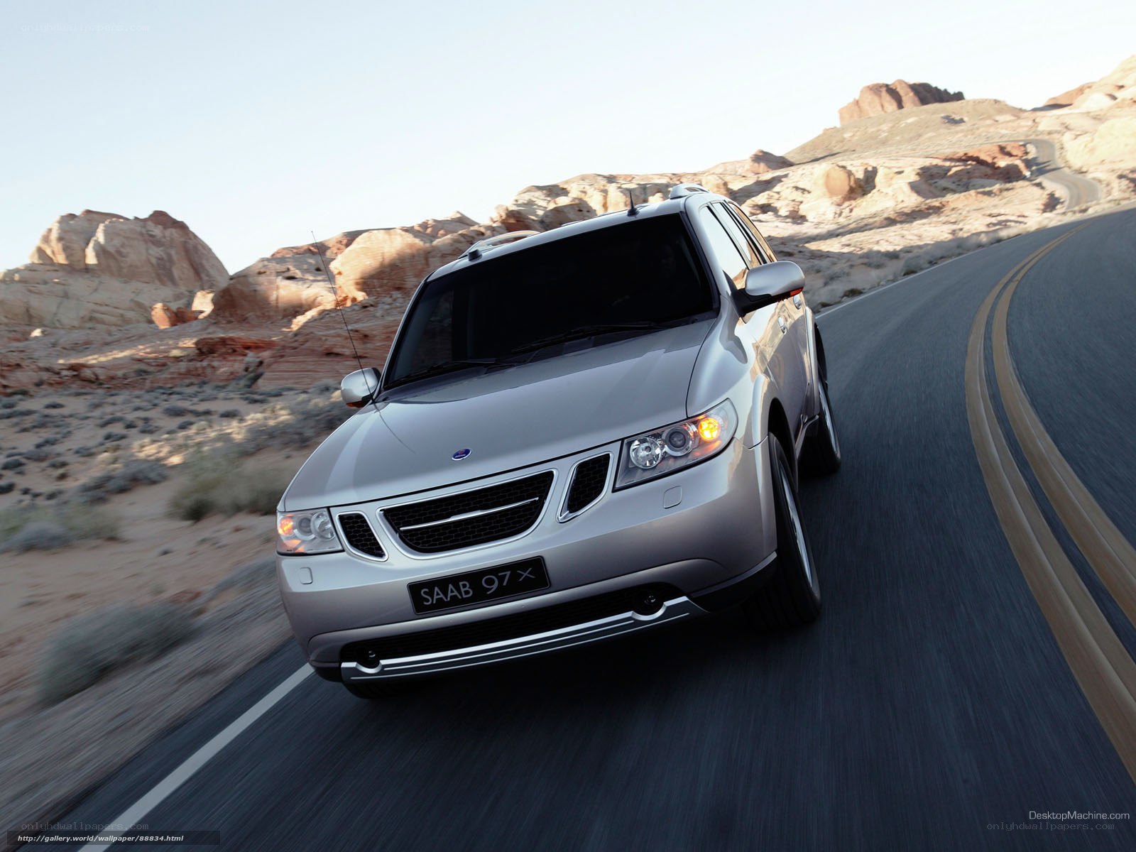 Silver Saab 9-7X on desert road