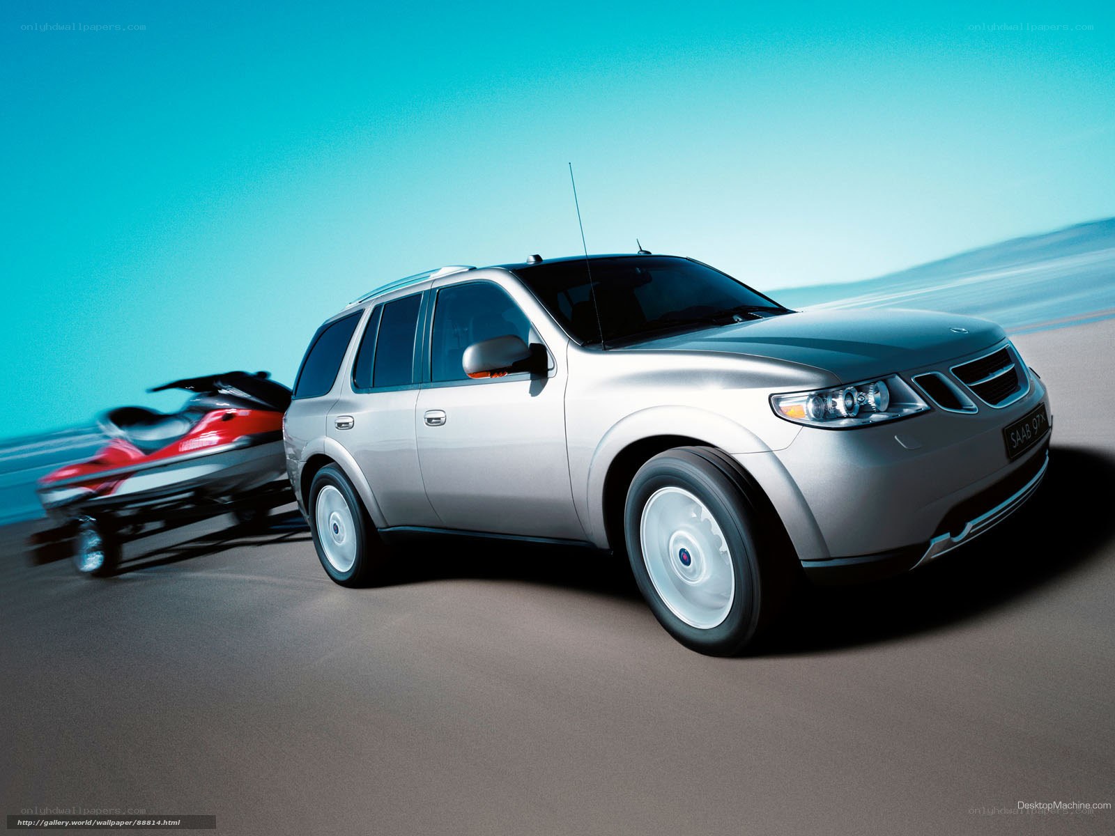 silver saab 9-7x towing jet ski