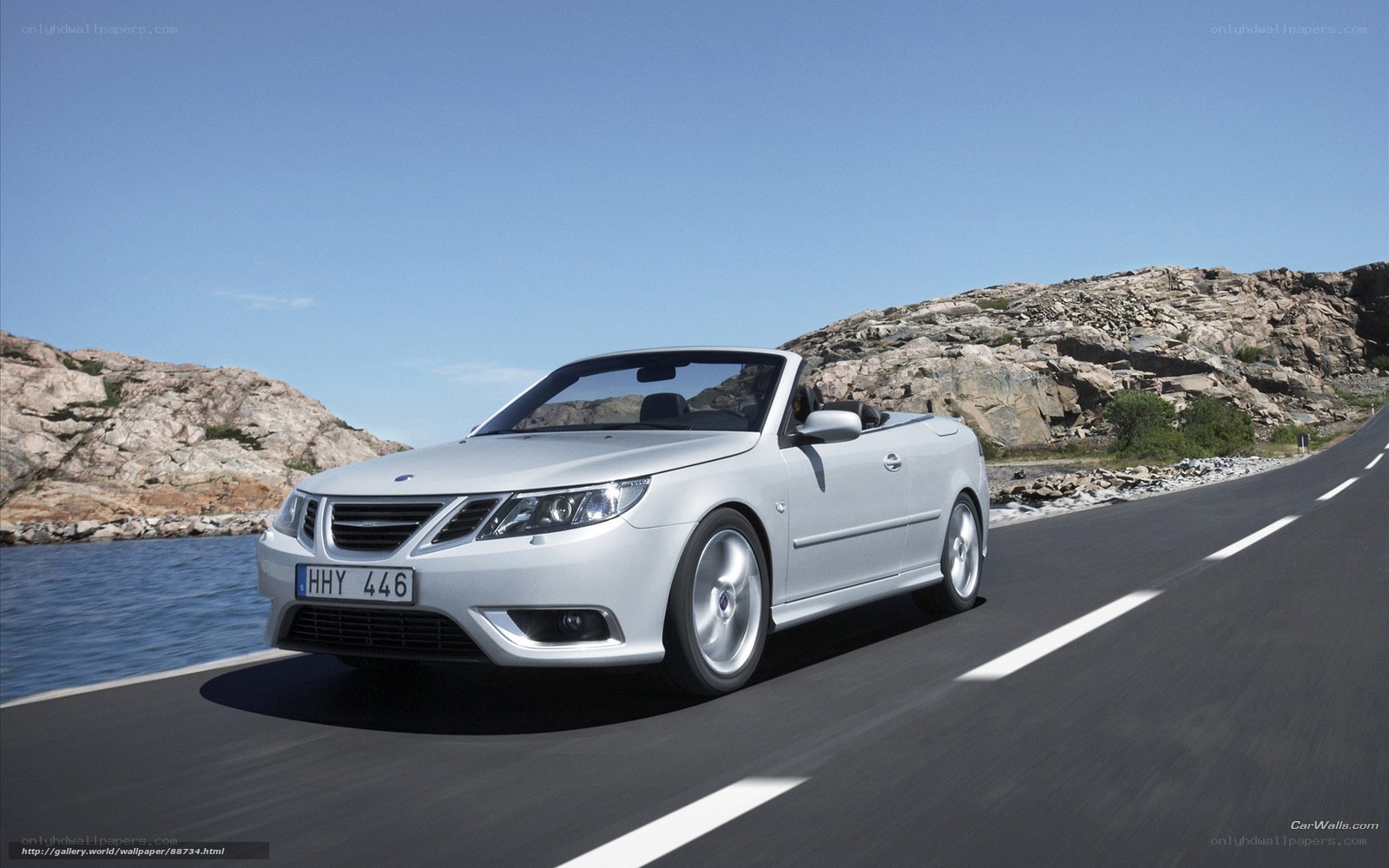 Silver Saab Convertible on Coastal Road