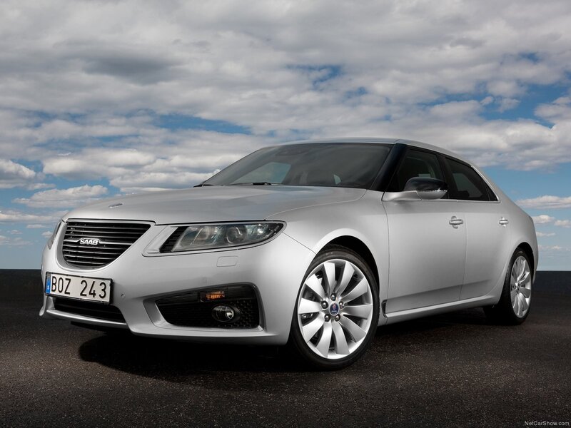Silver Saab Sedan — Dramatic