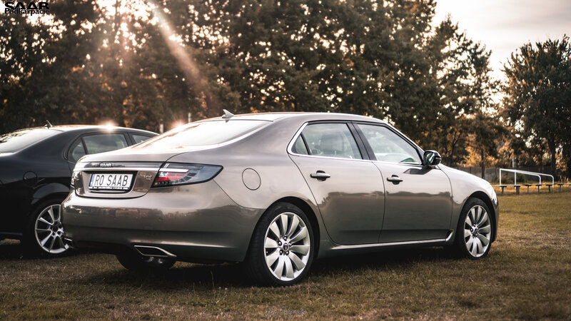Silver Saab Sedan — Gray