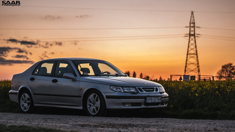 Silver Saab Sedan — Orange