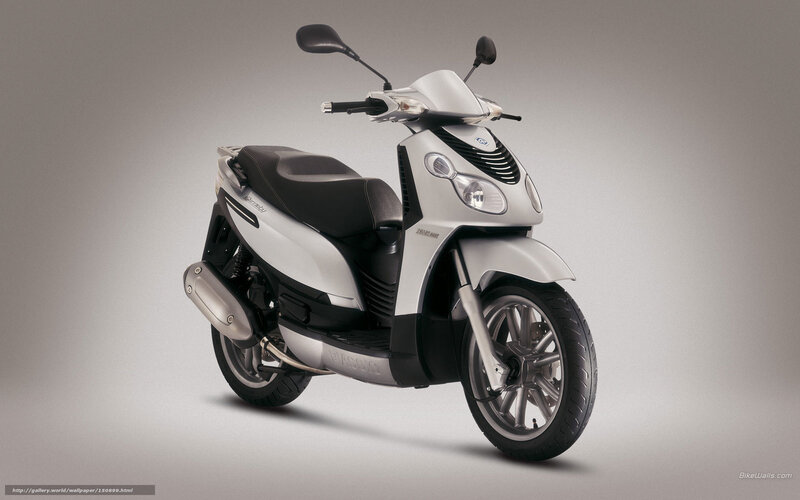 silver scooter on gray background