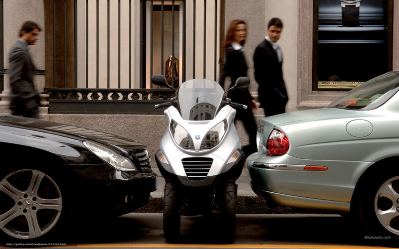 Silver Scooter on Street