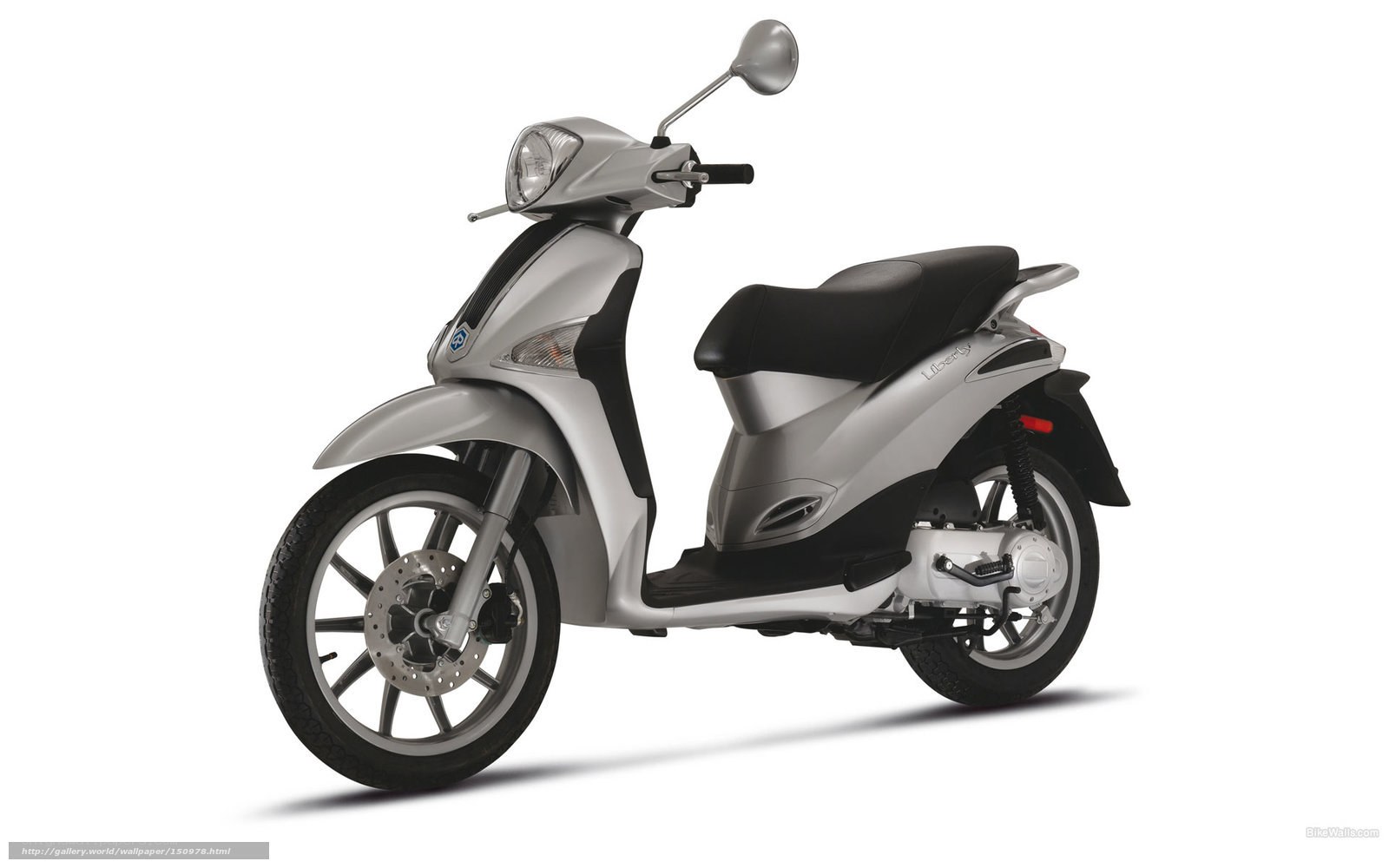 silver scooter on white background