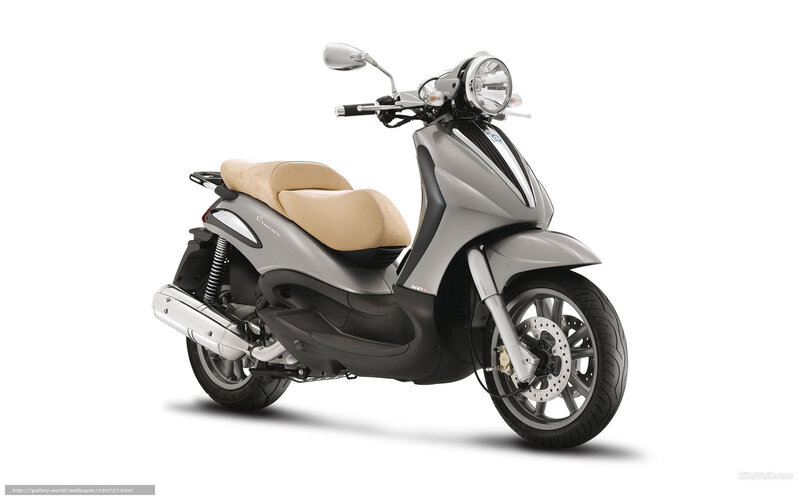 silver scooter with beige seat