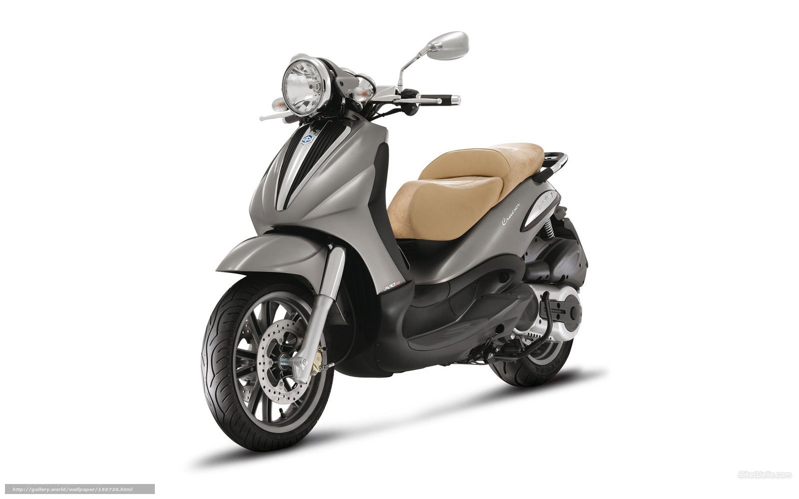 silver scooter with beige seat