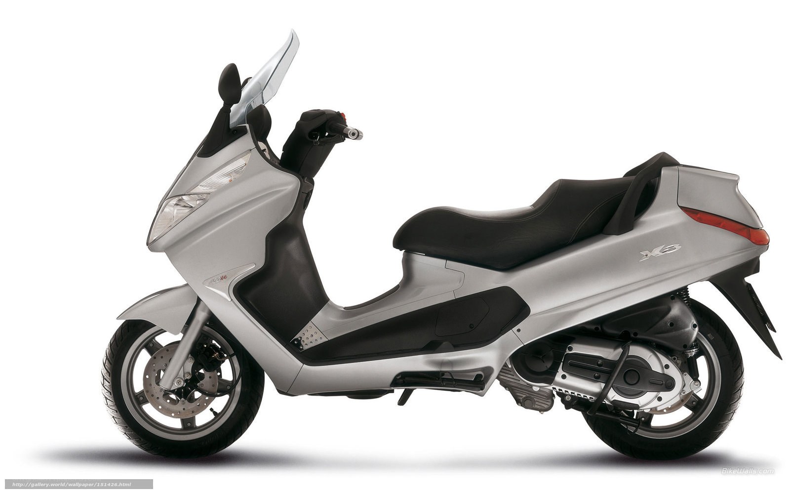 silver scooter with black seat