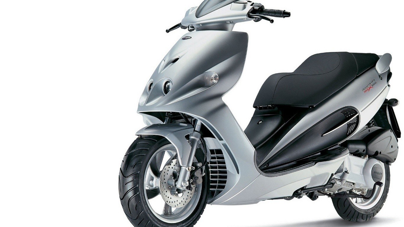 silver scooter with black seat