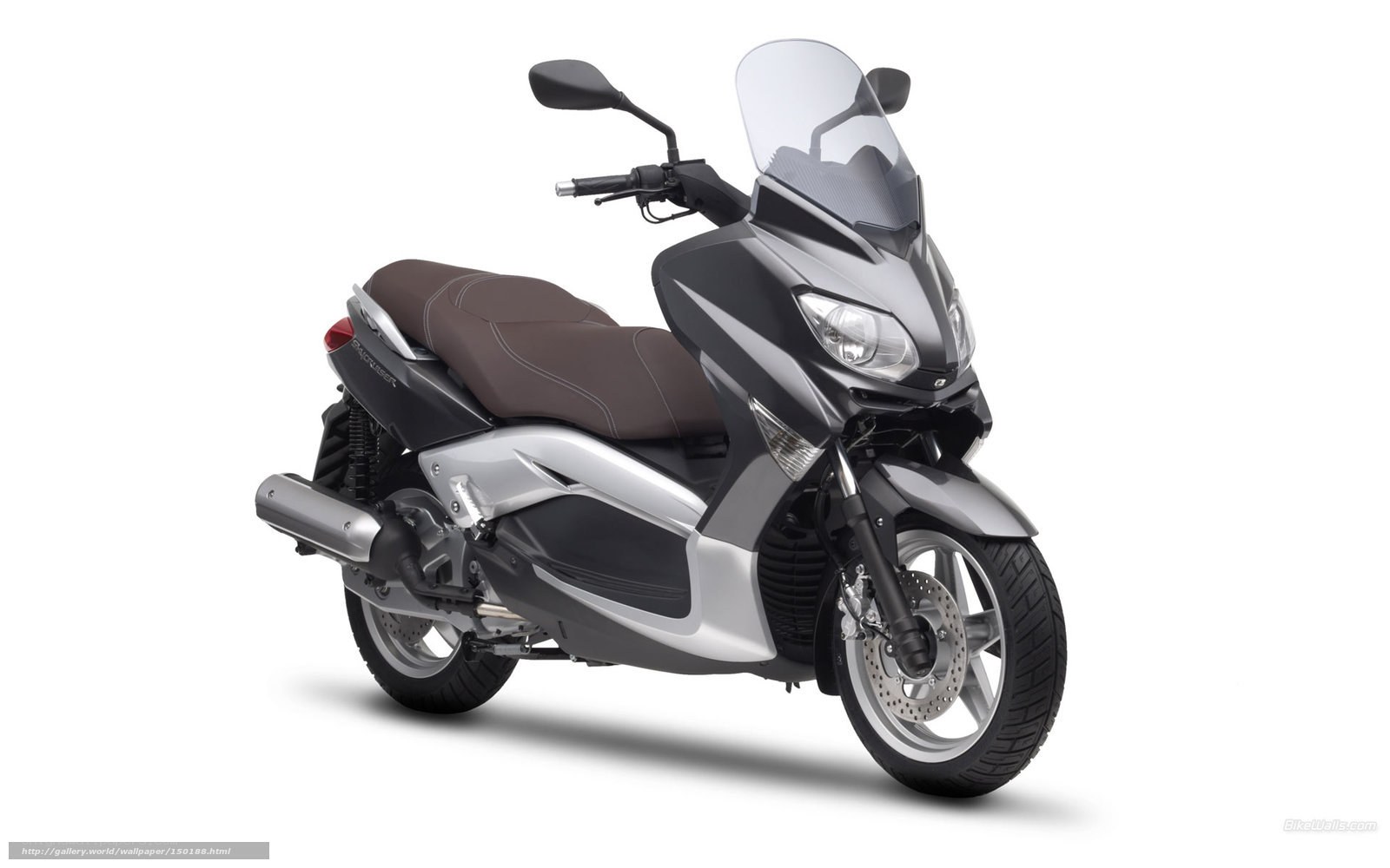silver scooter with brown seat