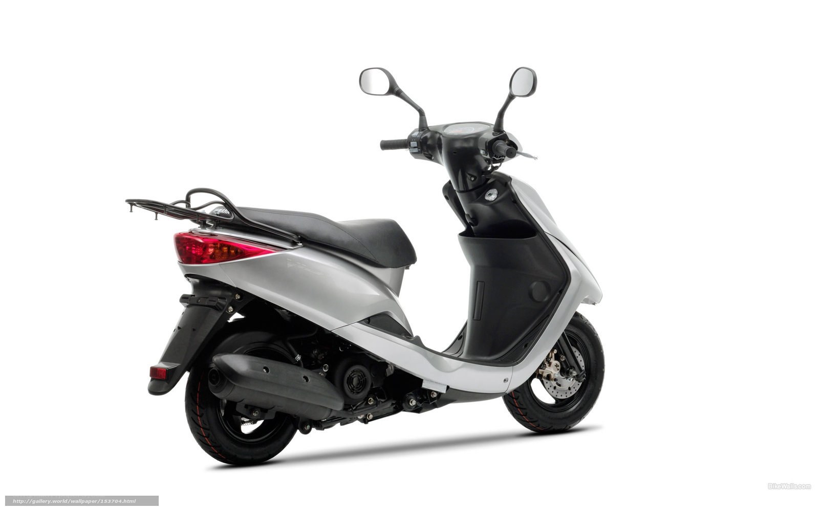 silver scooter with rear rack