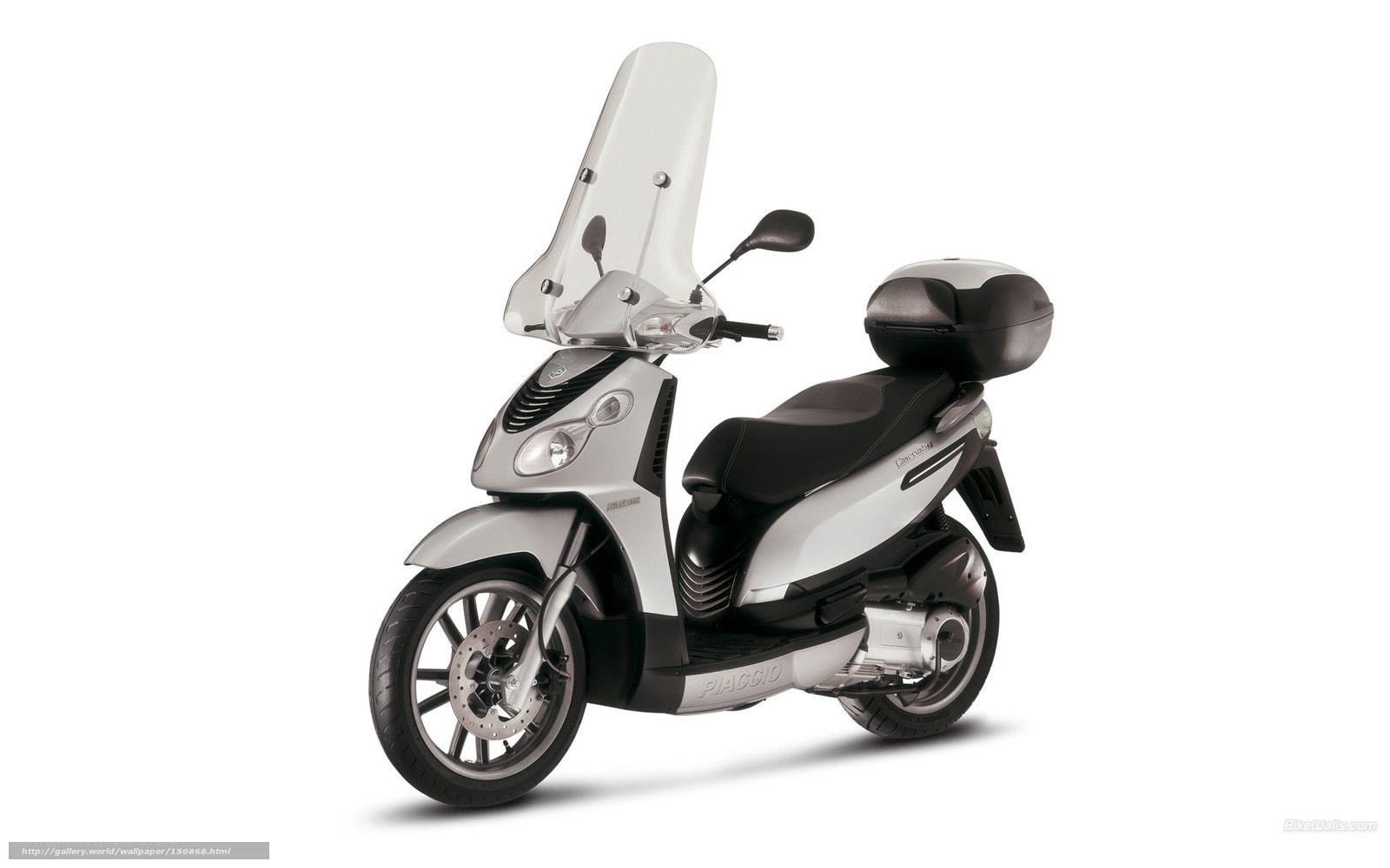 Silver scooter with windscreen