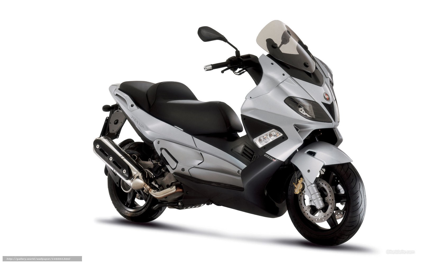 silver scooter with windscreen
