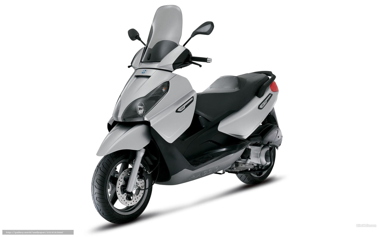Silver scooter with windscreen