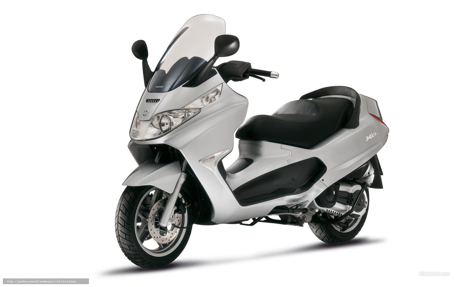 silver scooter with windscreen