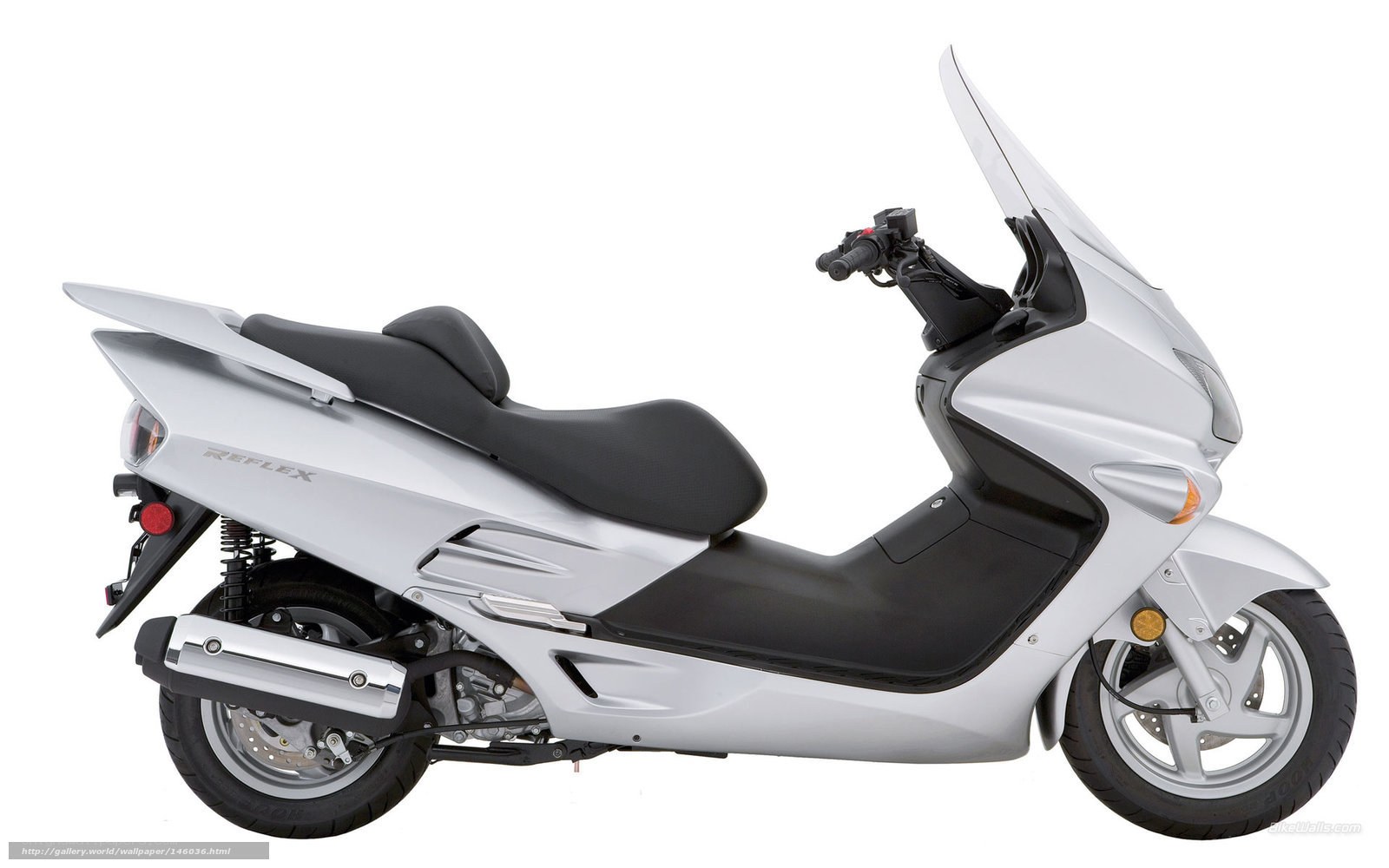 Silver scooter with windscreen