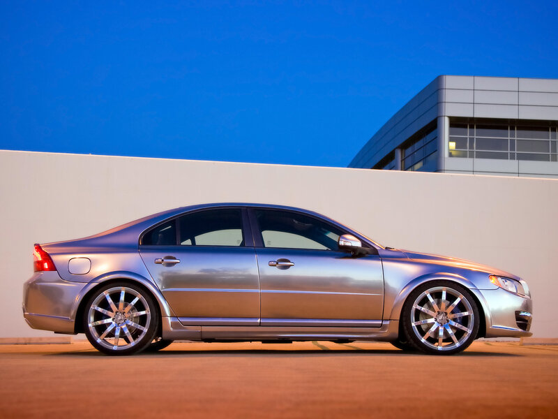 silver sedan at dusk