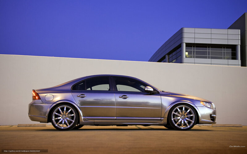 silver sedan at dusk