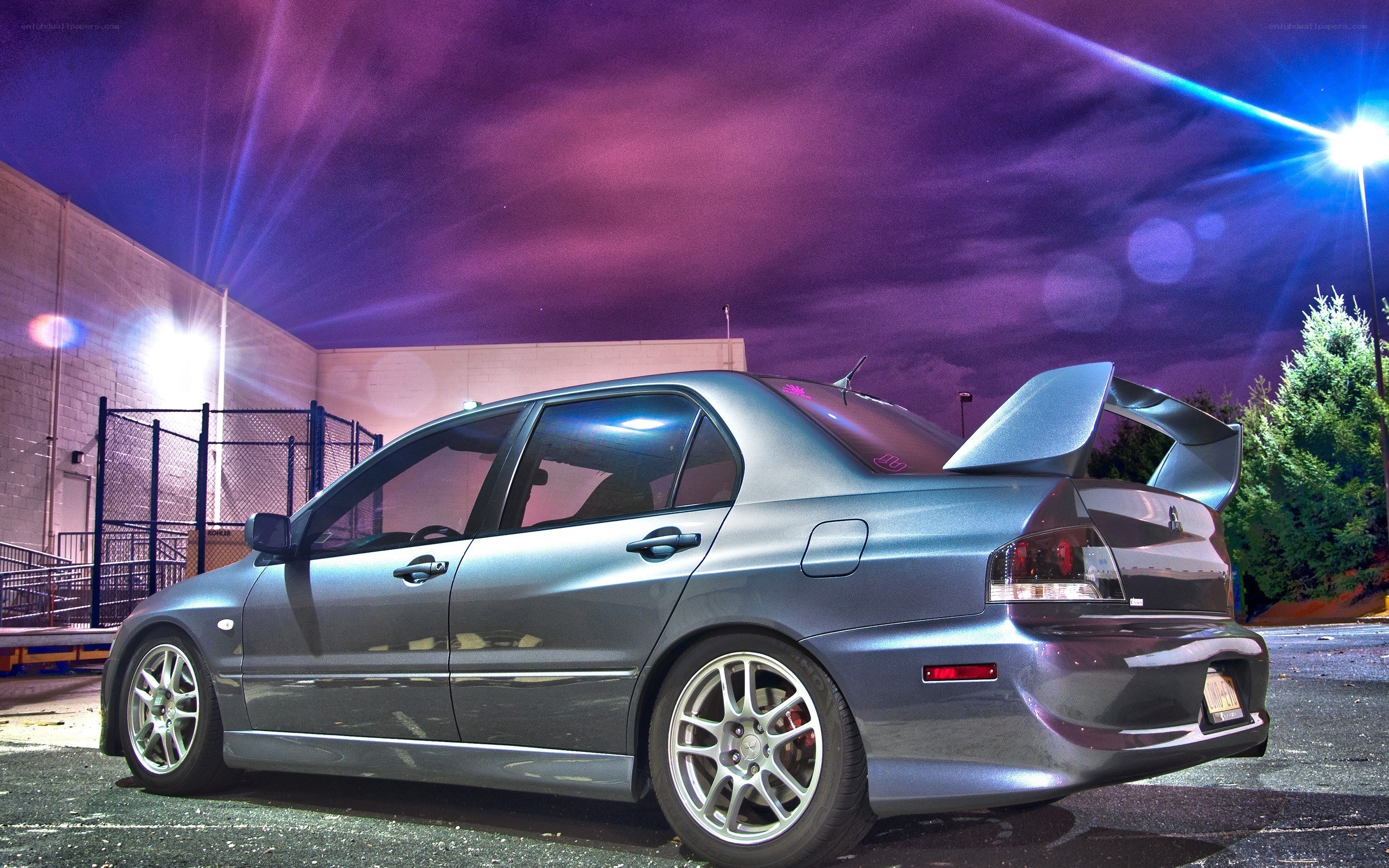 silver sedan at night