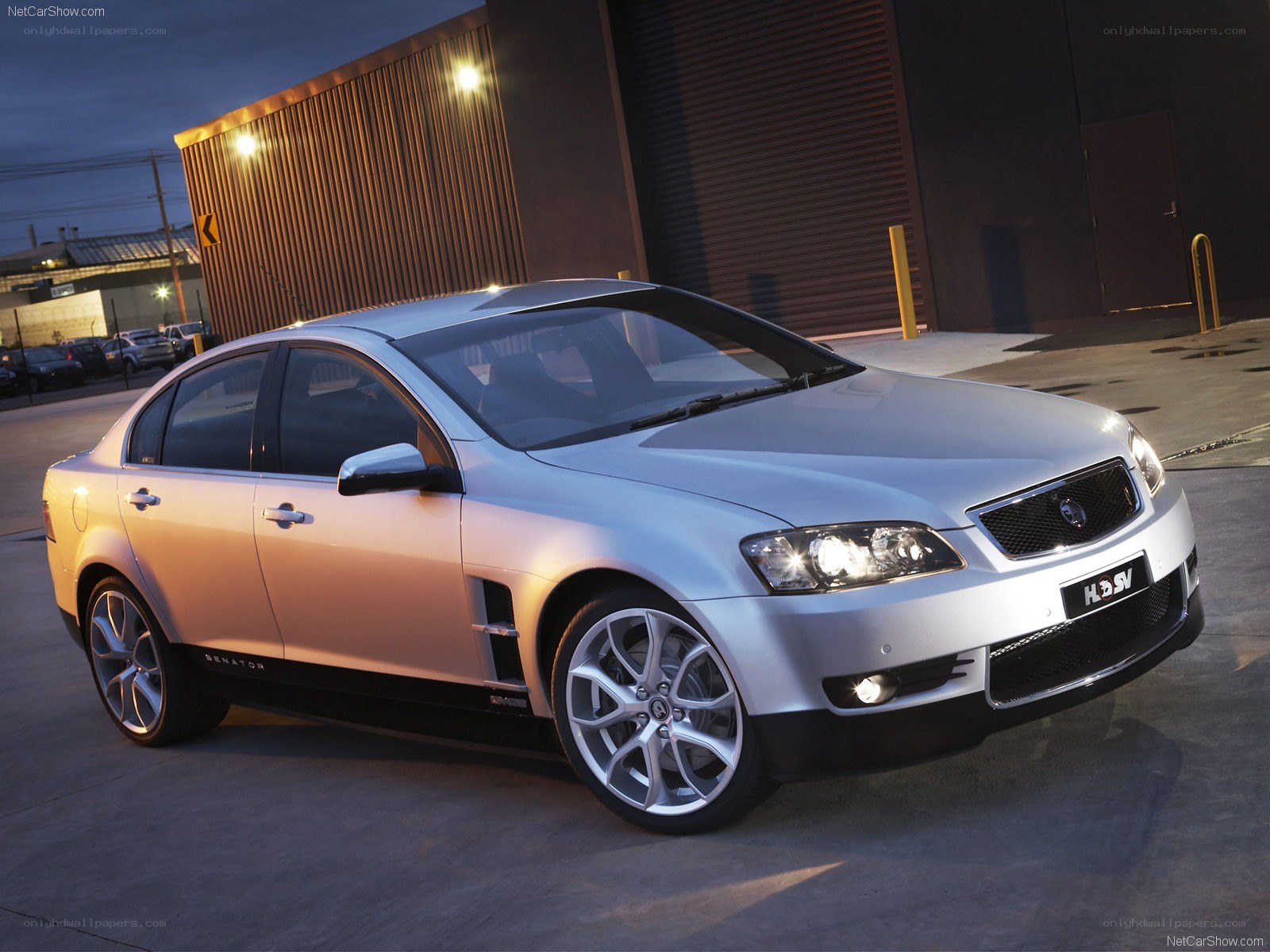 silver sedan at night