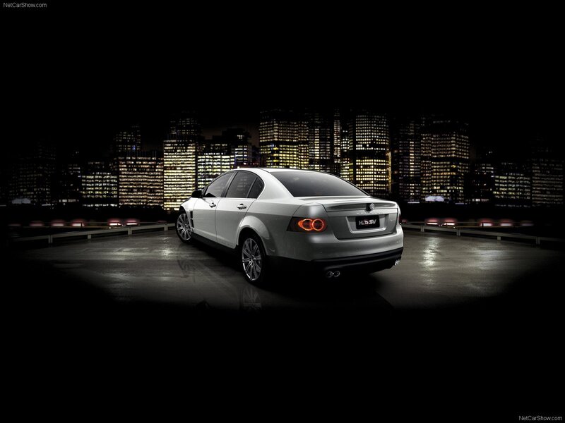 silver sedan at night city