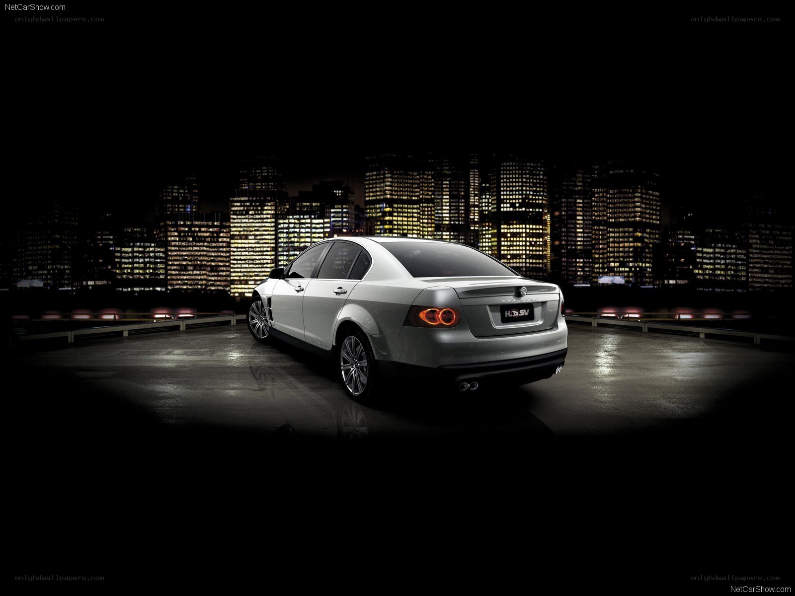 silver sedan at night city