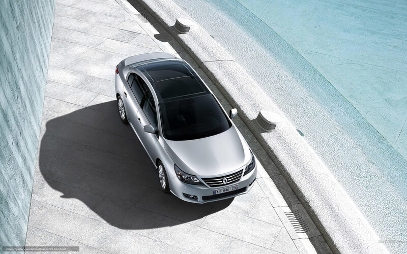Silver sedan by poolside