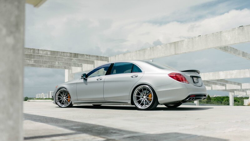 Silver Sedan Car — Calm, Afternoon, Photograph, Concrete Structure