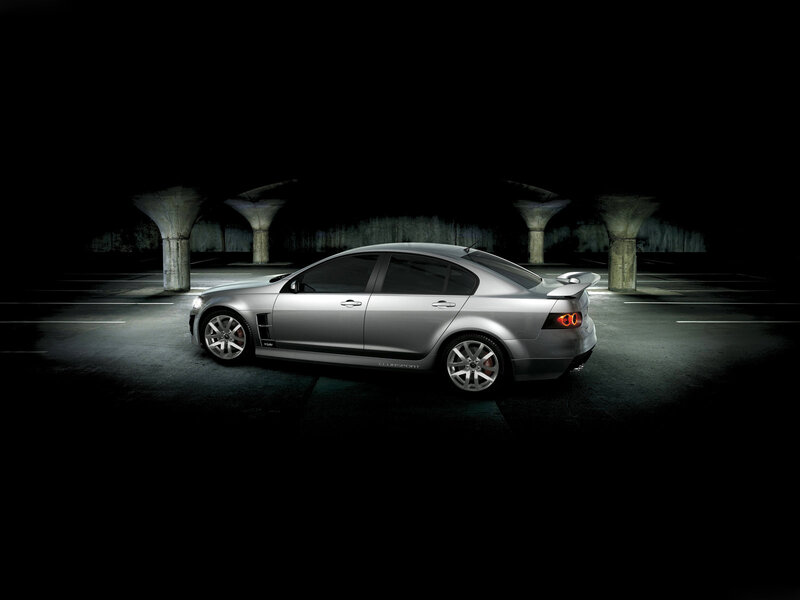 Silver Sedan Car — Dramatic, Night, Photograph, Concrete Pillars