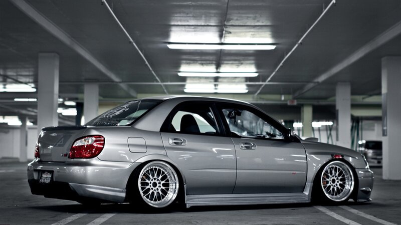 Silver Sedan Car — Gray, Dramatic, Photograph, Parking Garage, Wheels
