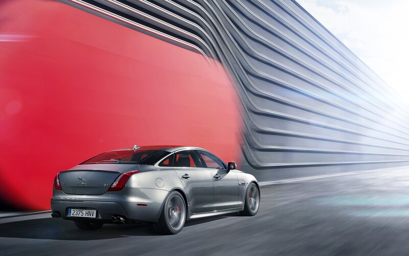 Silver Sedan Car — Gray, Dynamic, Photograph, Road, Building
