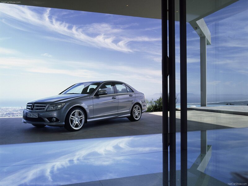 Silver Sedan Car — Gray, Serene, Afternoon, Photograph, Building, Sky