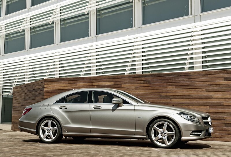 Silver Sedan Car — Modern, Afternoon, Photograph, Building, Wooden Wall