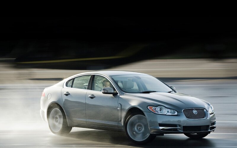 Silver Sedan Car — Road