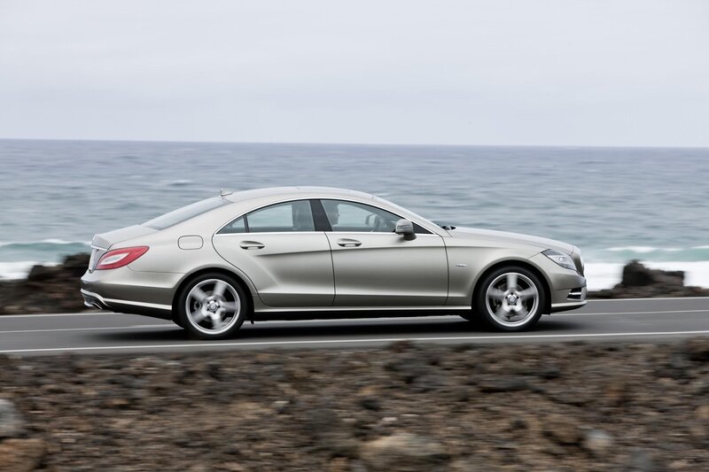 Silver Sedan Car — Serene, Afternoon, Photograph, Ocean, Road, Rocks