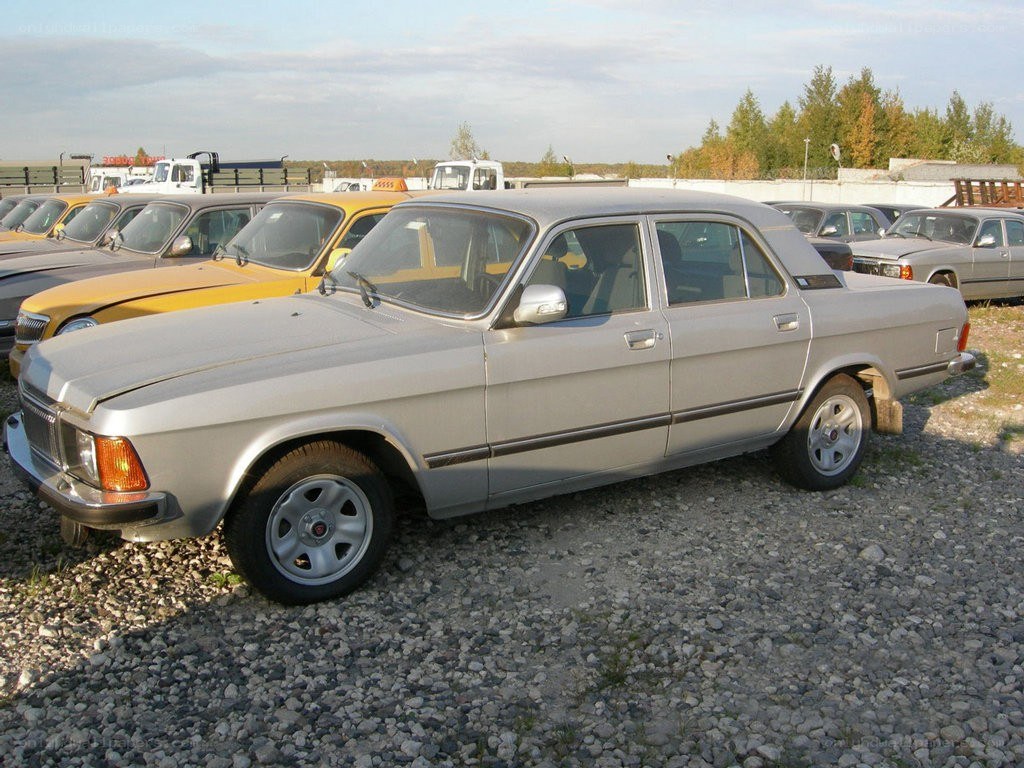 Silver sedan in a car lot