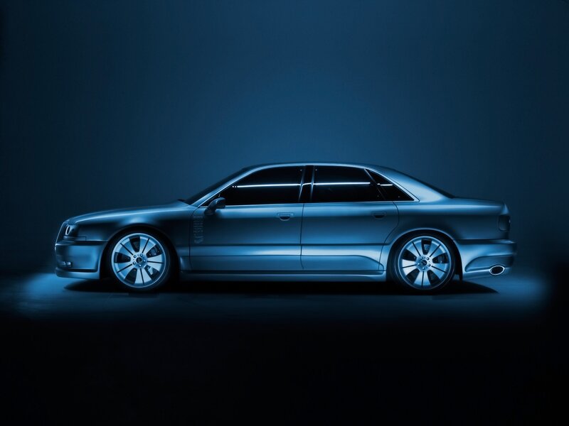 silver sedan in blue light