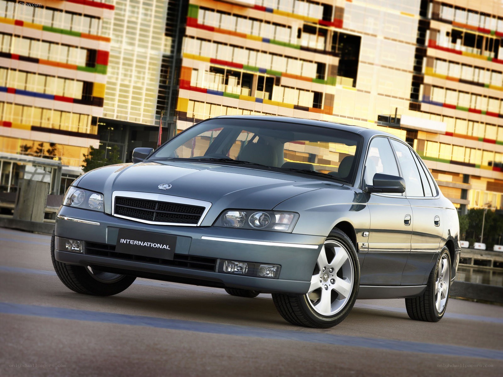 silver sedan in city