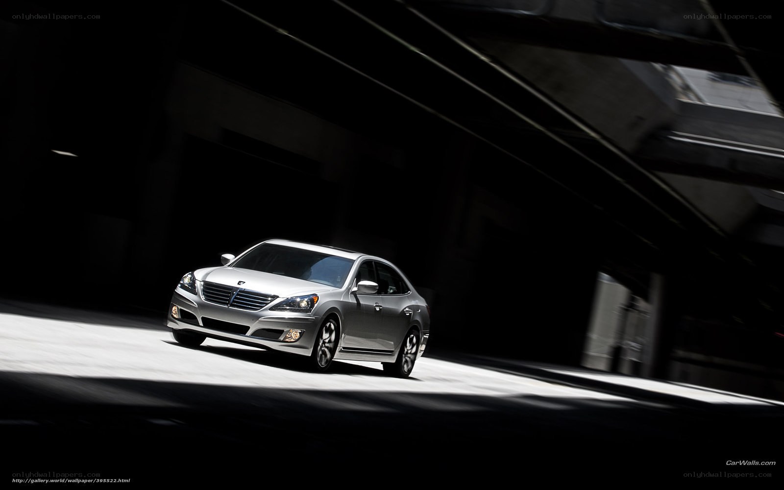 silver sedan in dark tunnel
