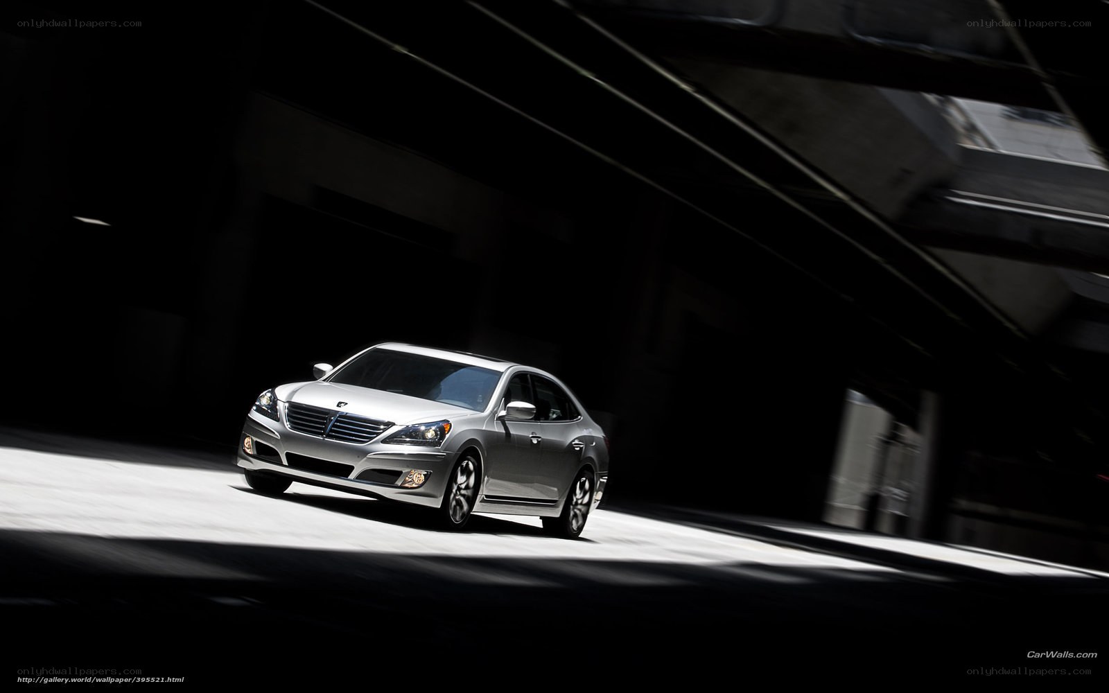 silver sedan in dark tunnel