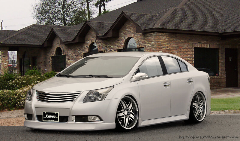 silver sedan in front of house