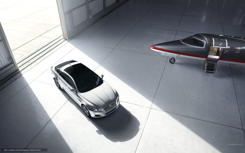 Silver Sedan in Hangar — Gray, Dramatic