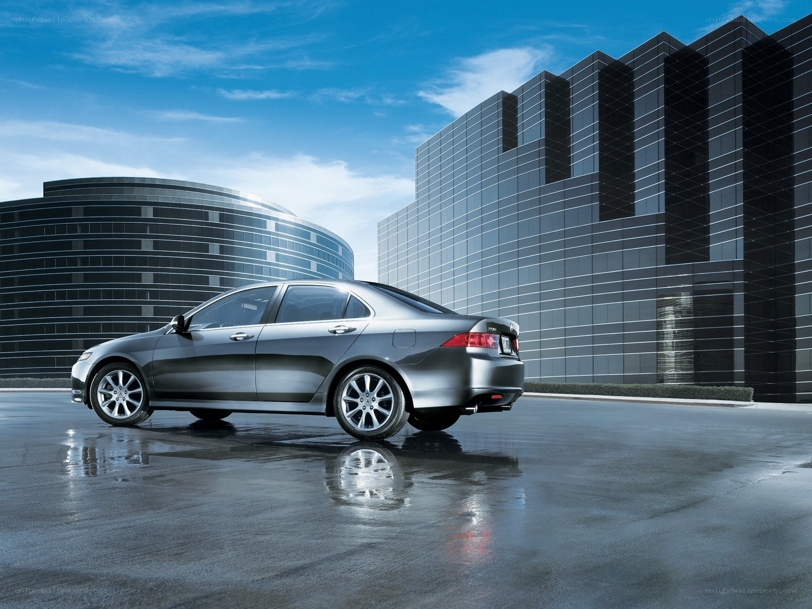 Silver sedan in modern city