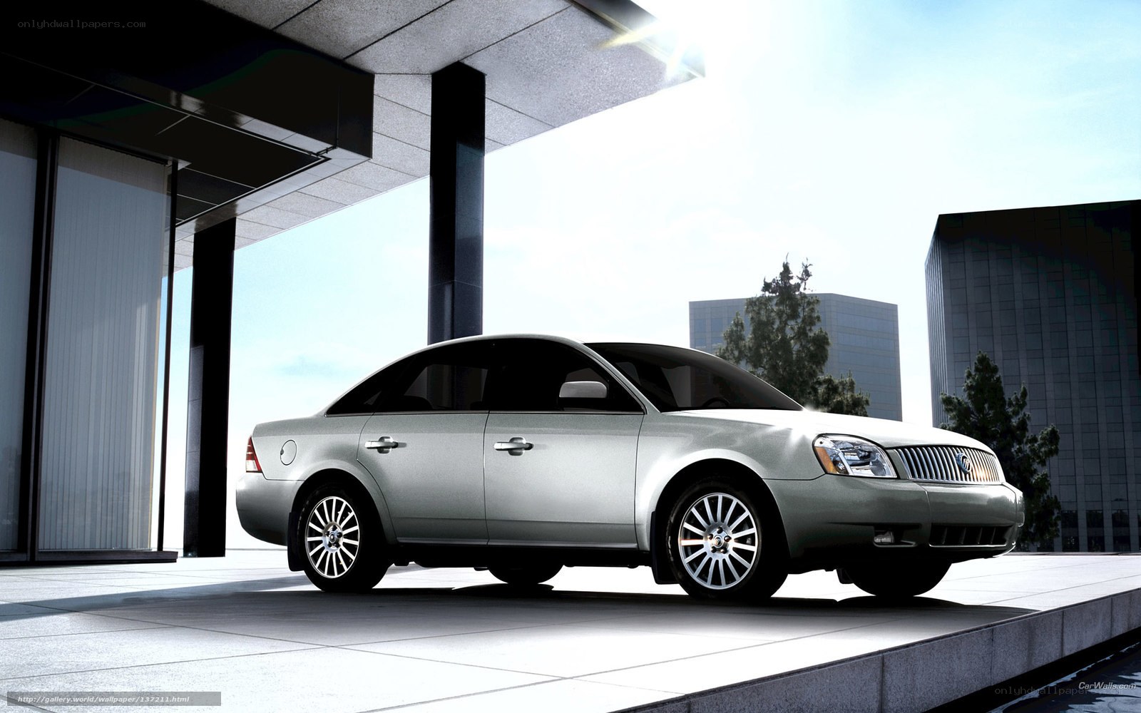 Silver sedan in modern city