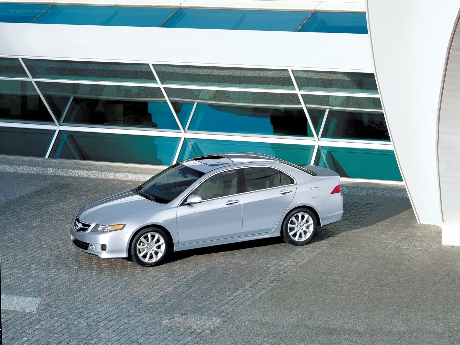 Silver sedan in modern setting