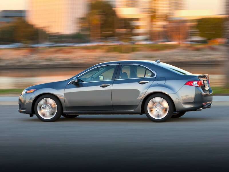 silver sedan in motion