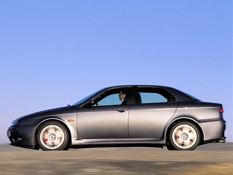 silver sedan in motion