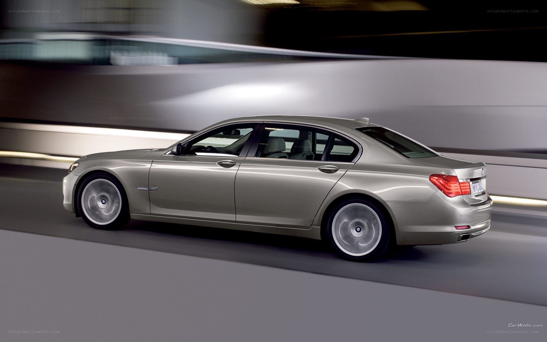 silver sedan in motion